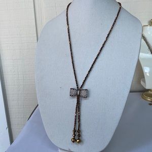 Copper faceted bead rhinestone bow necklace